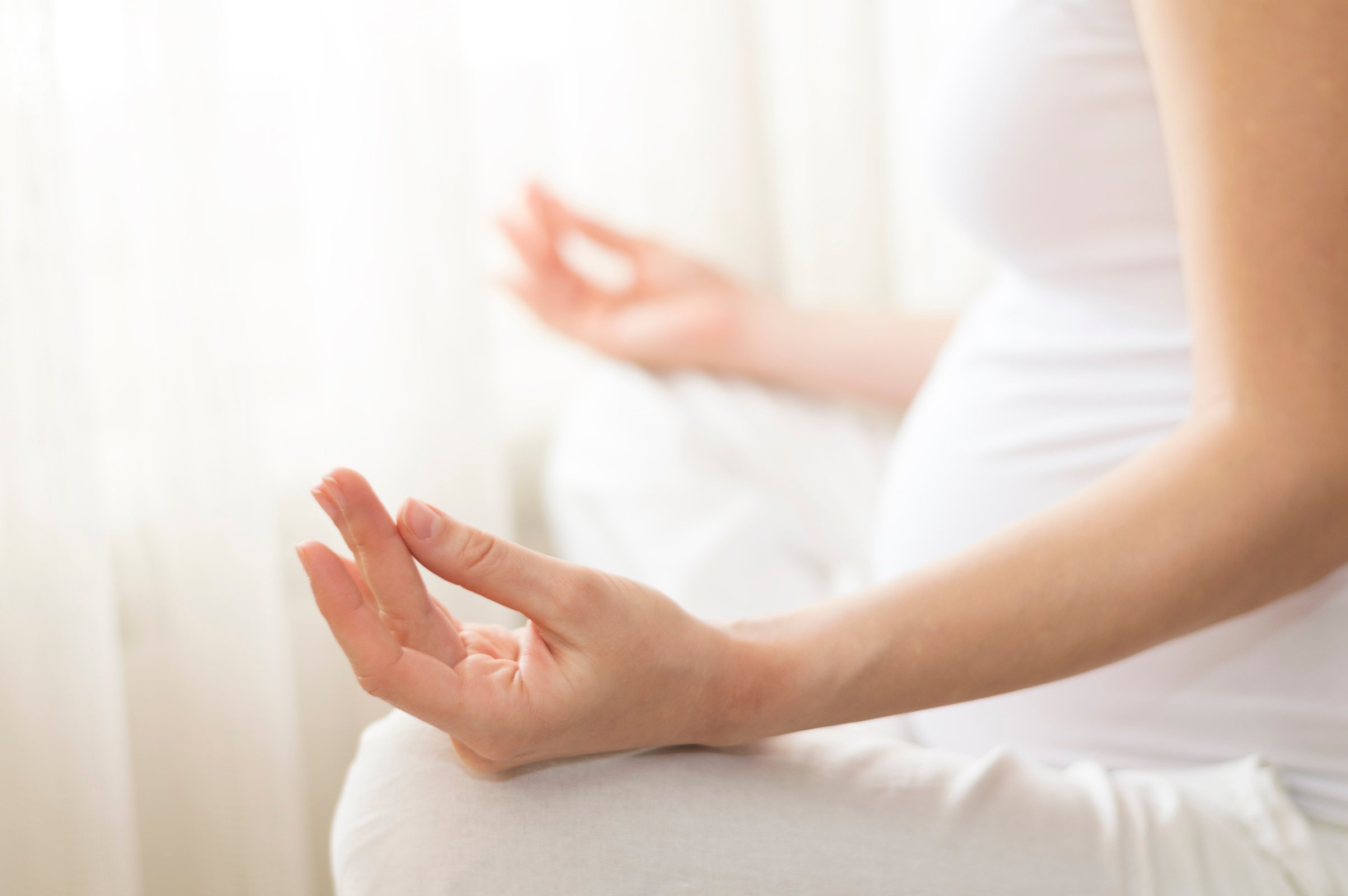 Pregnant woman doing yoga